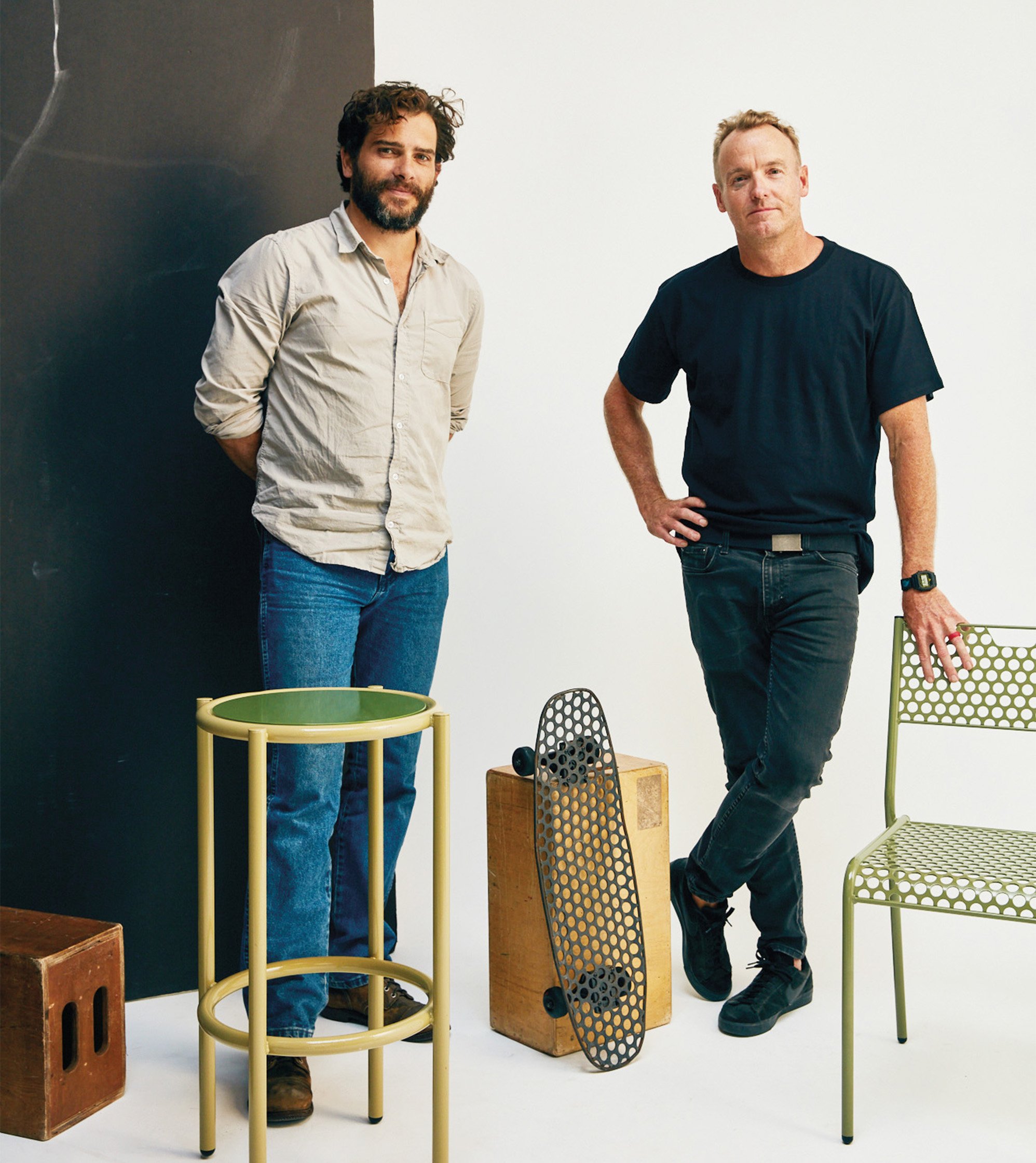founders of RAD Furniture posing with their products